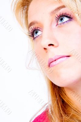 Studio portrait of a long blond girl looking high Studio portrait of a long blond girl looking high
