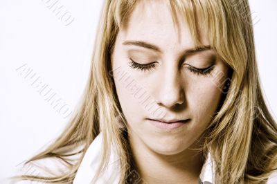 Studio portrait of a long blond girl looking relaxed Studio portrait of a long blond girl looking relaxed