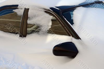 Car covered by snow Car covered by snow