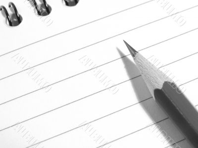 notepad with pencil