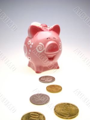 piggy bank and many coins