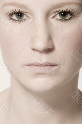 Classical studio portrait of a young woman with short hair Classical studio portrait of a young woman with short hair