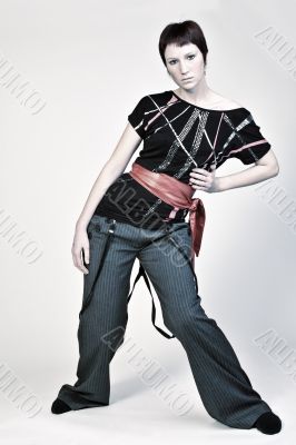 Studio portrait of a fashinable young woman with short hair Studio portrait of a fashinable young woman with short hair