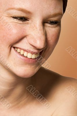 Studio portrait of a young woman with short hair having fun