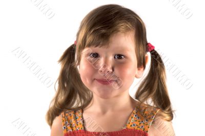 Smiling little girl with ponytails