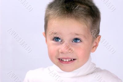 Beautiful blue eyed kid looking up