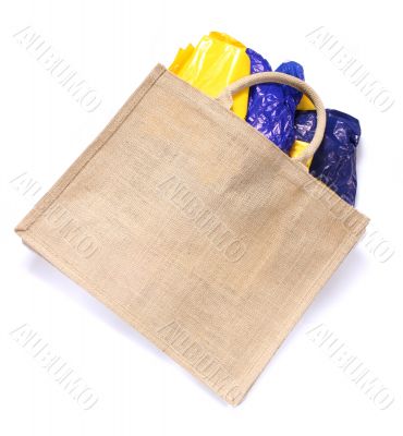 Modern ecological bag eating plastic bags