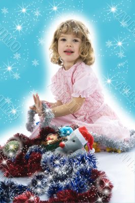 Beautiful little girl with christmas decoration