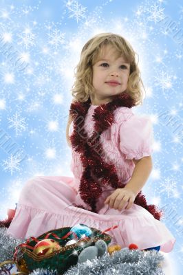 Beautiful little girl with christmas decoration