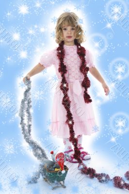 Beautiful little girl with christmas decoration