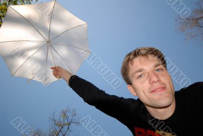 guy with  white umbrella above  head