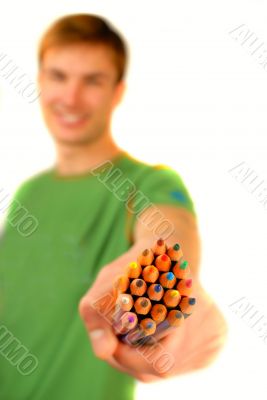 color pencils in  hand
