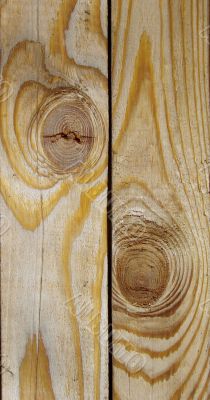 Knot on textured wooden plank