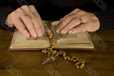 Old hands by reading the bible