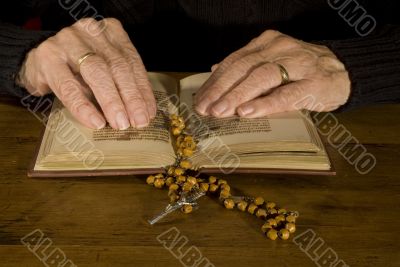 Old hands by reading the bible Old hands by reading the bible