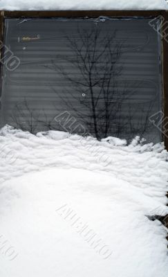 snow covered solar hot water heater