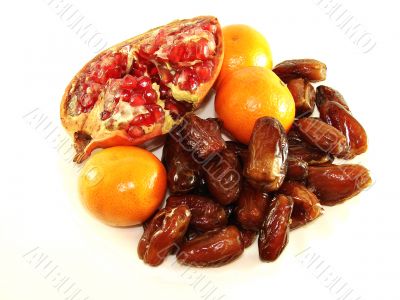 pomegranate. tangerines. dates