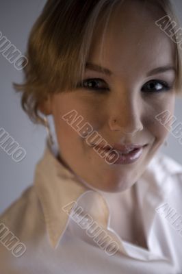 Portrait of a cute blond curly woman