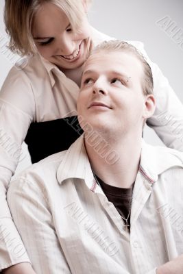 Portrait of a young loving couple looking