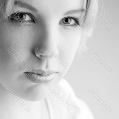 Portrait of a confident blond curly woman