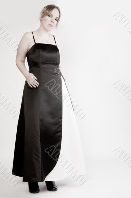 Portrait of a blond curly woman in a gala dress Portrait of a blond curly woman in a gala dress