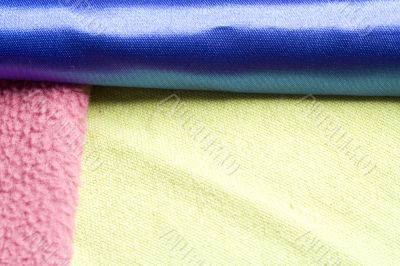 Yellow, pink and blue blanket
