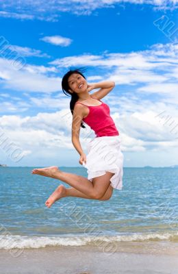 in the air leap by the beach in the air leap by the beach