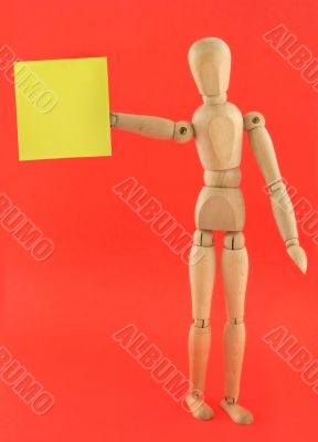 figure holding empty adhesive note