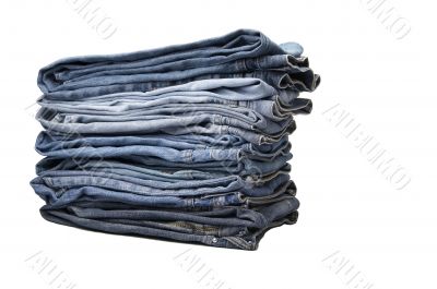 the heap of modern designer blue jeans