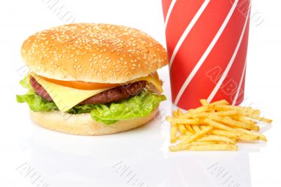 Cheeseburger, soda drinks and french fries