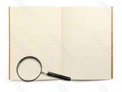 exercise book and magnifying glass