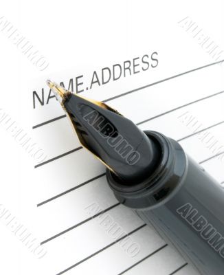 pen tip and address book