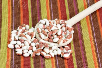 Beans on a cooking spoon