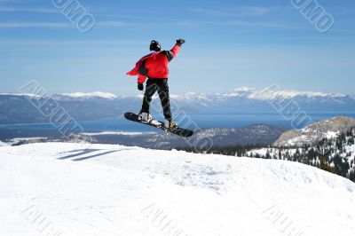 Snowboarder enjoying a view Snowboarder enjoying a view