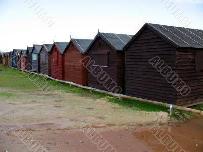 A row of beach huts during the winter months.