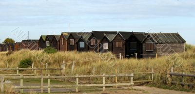 Beach huts on sand dunes