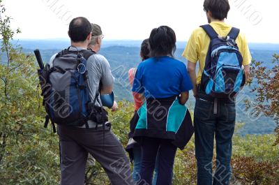Group of students standing on the mountain top