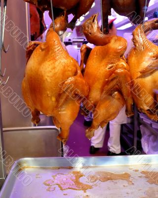 Roasted Chickens in Poultry Market