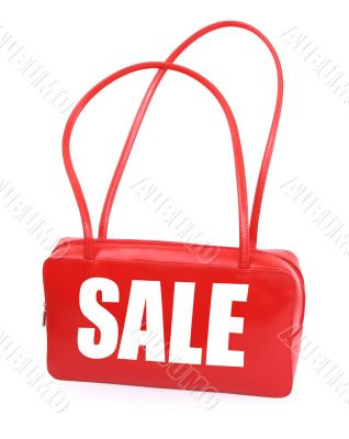 handbag with red sale sign