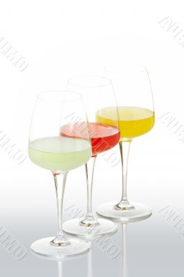 Three glasses with beverages