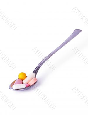 Pills in a spoon