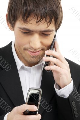 businessman with two cellular phones