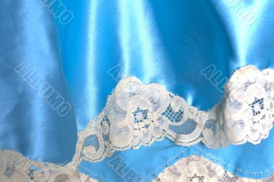 Blue fabric with white lace