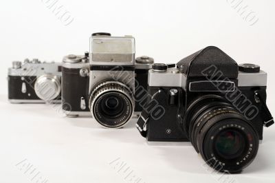 Three photo cameras