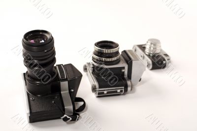 Three photo cameras