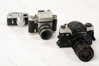 Three photo cameras