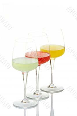 Three glasses with beverages