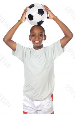boy holding a soccer ball boy holding a soccer ball