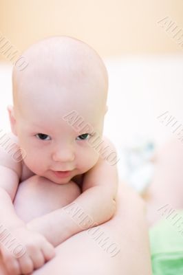 Baby enjoy after nursing by his mother