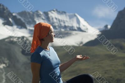 Relaxing girl in the mountains